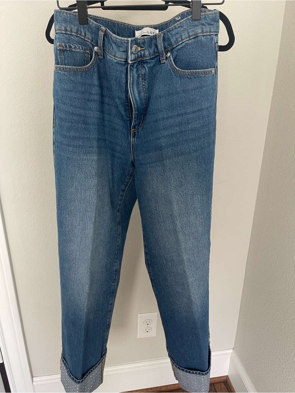 Women’s Rhinestone cuff jeans.